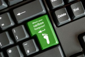 keyboard with a key that says, "what's your carbon footprint?"