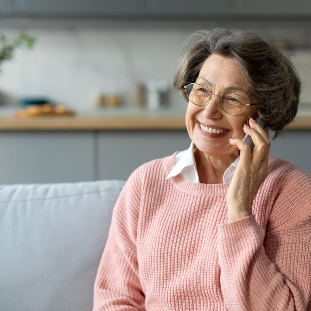 woman on a phone call doing the RCEA home energy assessment